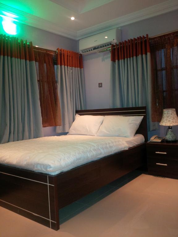 Haute Aparthotel Ikeja Rum bild